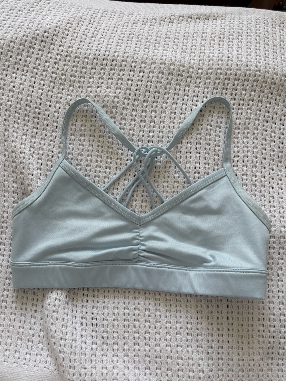 Alo yoga light blue sports bra in a size small